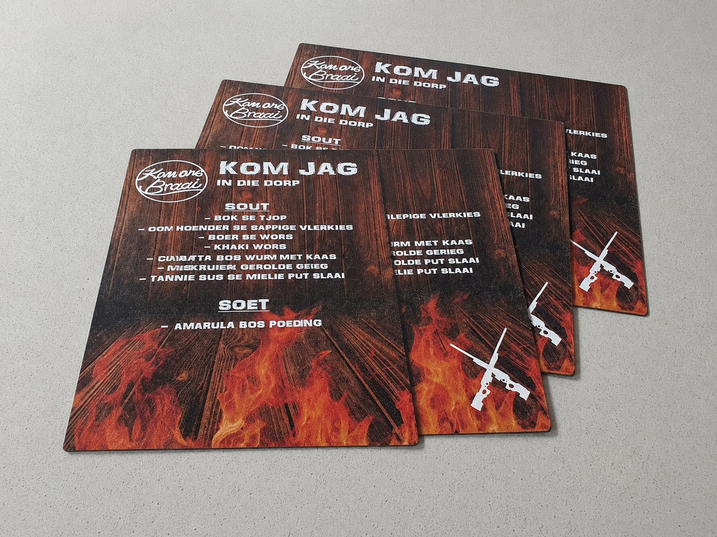 Set of custom printed menu boards produced by Dynamic Signs & Print for a food business.