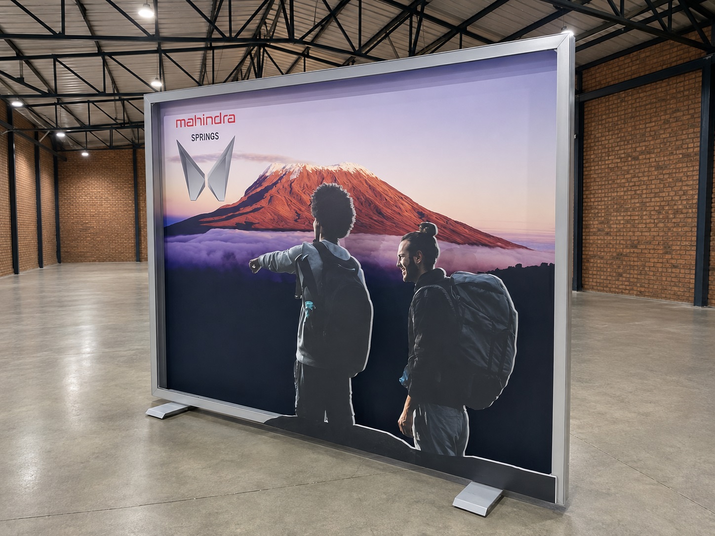 Custom Mahindra freestanding display with printed graphics and aluminium framing produced by Dynamic Signs & Print