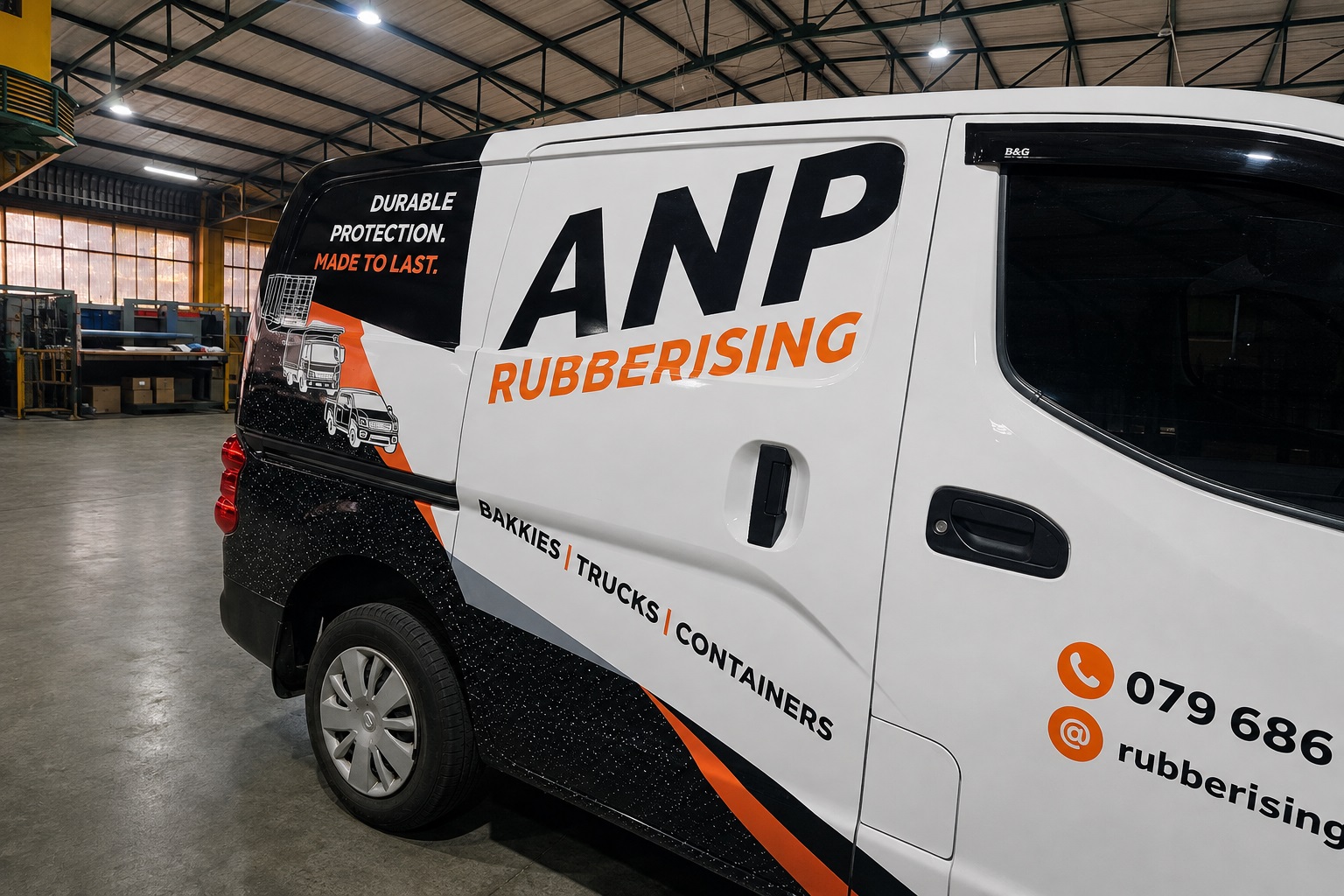 ANP Rubberising van with completed vehicle graphics inside the Dynamic Signs & Print workshop.